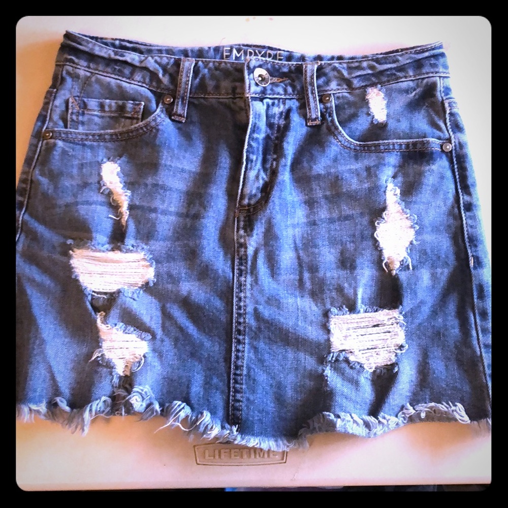 Distressed denim mini skirt